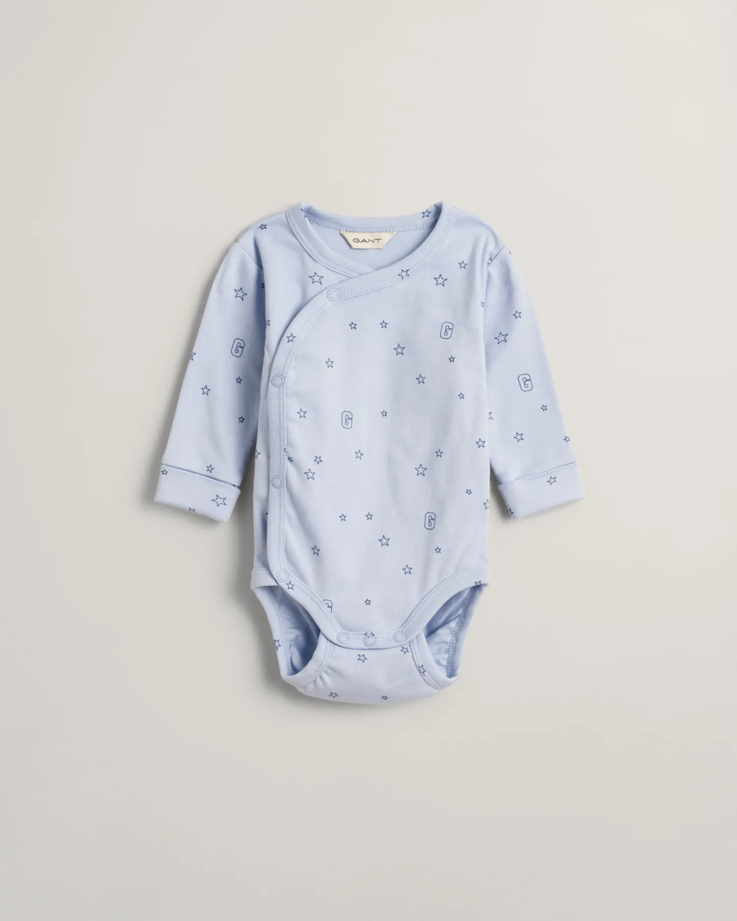 Body con stampa di stelle e G Baby
