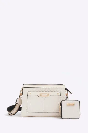 River Island - Borsa a tracolla con monogramma